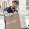 delivery-man-with-parcel-looking-away